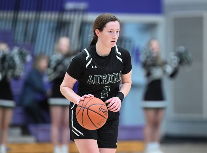Aurora guard Sam Stask surveys the defense in a game at Barberton on January 26, 2024